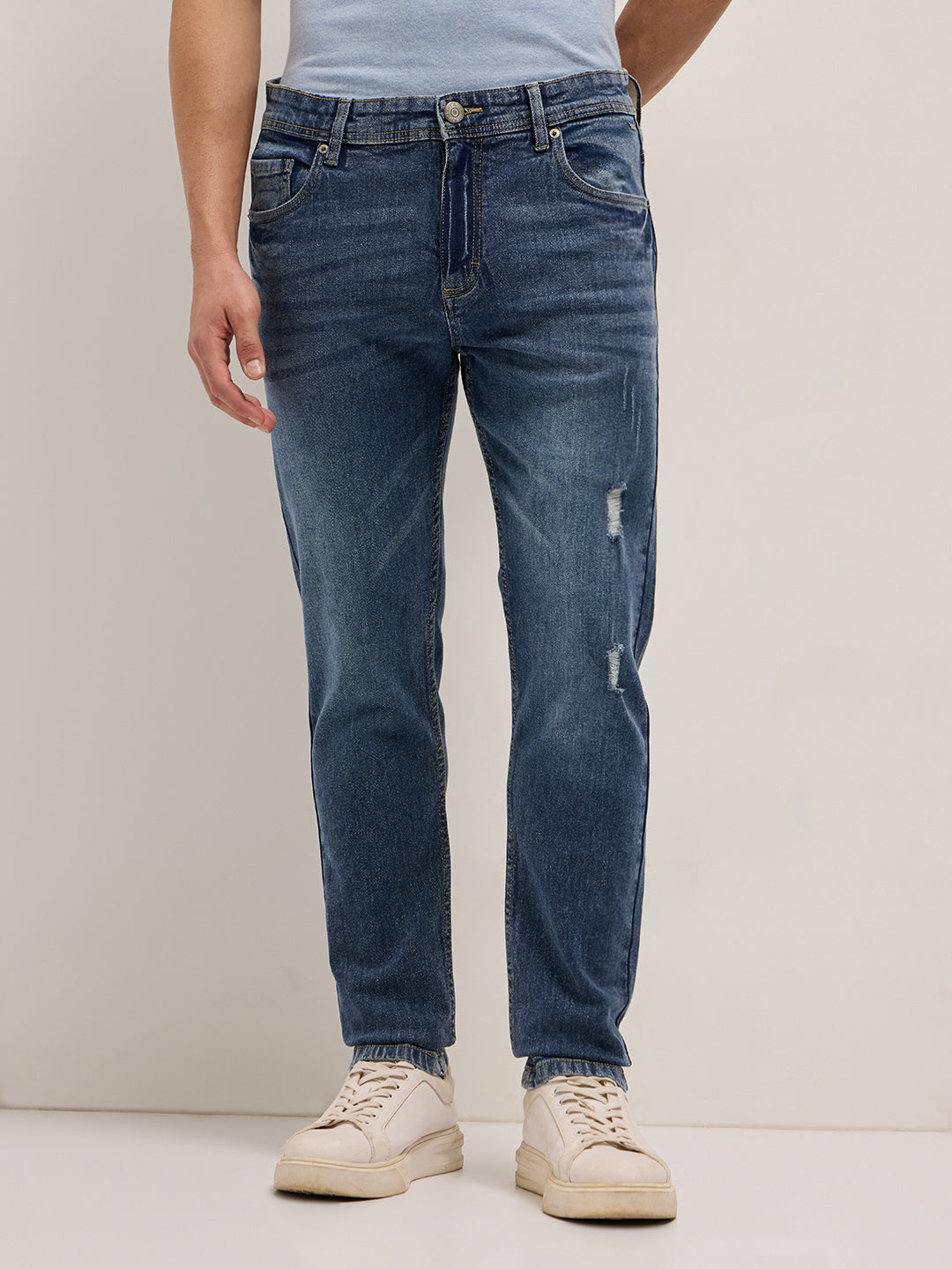 Mid Blue Mid-Rise Slim Fit Jeans with Lightly distressed