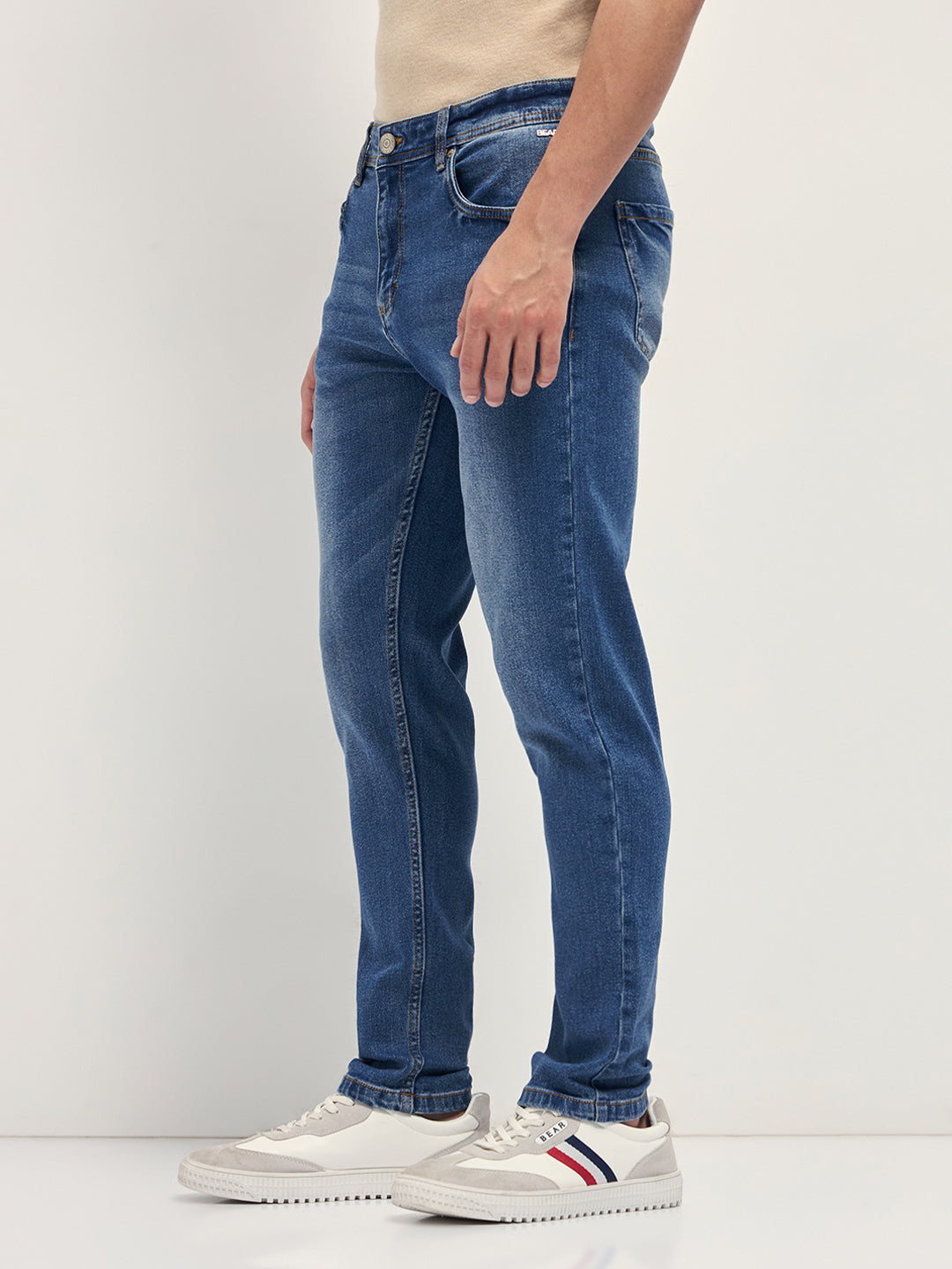 Mid Blue Mid-Rise Slim Fit Jeans with Light Fade
