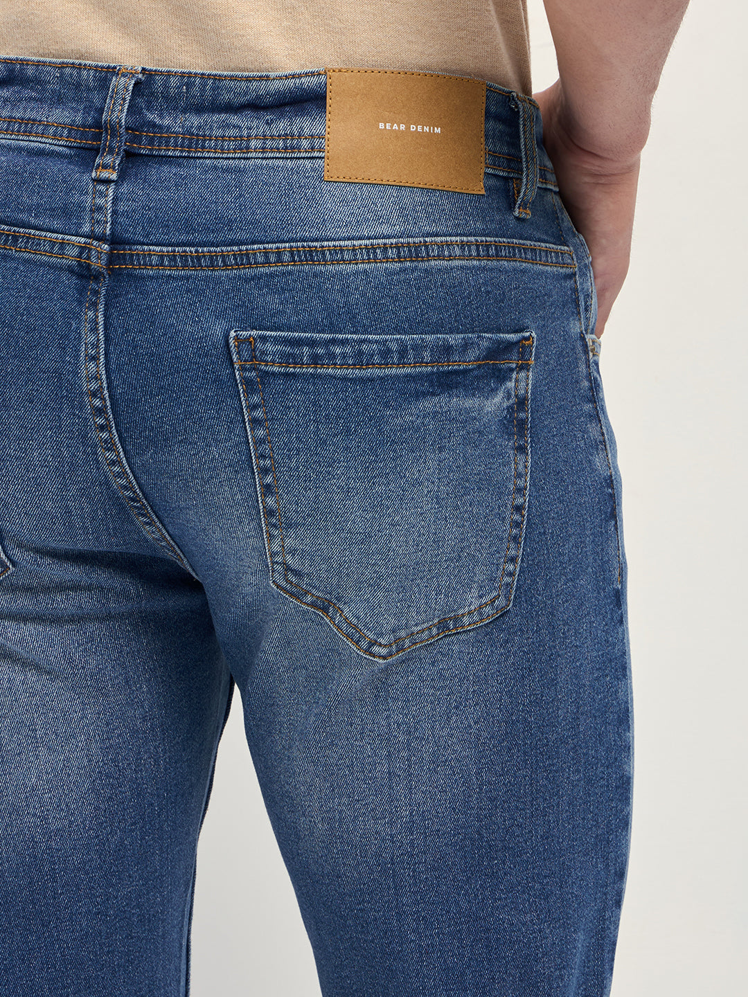 Mid Blue Mid-Rise Slim Fit Jeans with Light Fade