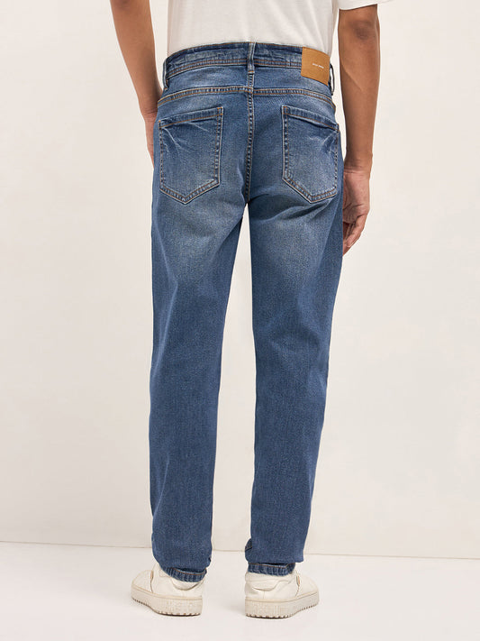 Mid Blue Mid-Rise Slim Fit Jeans with Lightly distressed